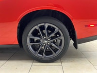 Meet the 2022 Dodge Challenger GT in a vibrant orange finish, gracefully combined with an AWD drivet... (image 4)