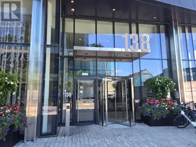 Experience iconic waterfront living in this high-floor luxury suite at Sugar Wharf Condos. Situated...