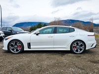 The 2019 Kia Stinger GT in an eye-catching White color with AWD drive technology offers remarkable h... (image 3)