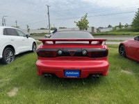 La Pontiac Firebird Trans Am 1994 est lun des modèles les plus emblématiques de lère des voitures sp... (image 4)