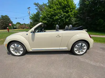 Own a piece of automotive history with this stunning 2019 Volkswagen Beetle Convertible. As the fina...