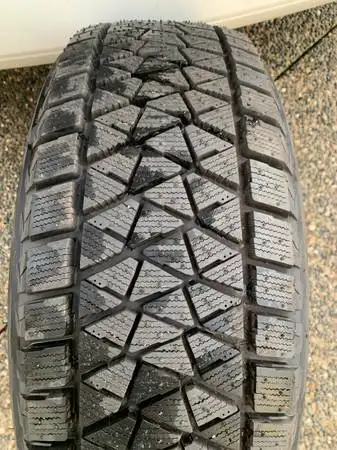 YES WE DO SHIP ACCROSS CANADA AND USA AT VOLUME DISCOUNT RATES a nice Bridgestone Blizzak winter tir...
