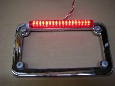 Used Backoff chrome/led license frame can operate as taillight and then brake light very good used c...
