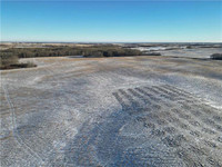 153 acres of gently rolling landscape with view of Minnedosa, MB