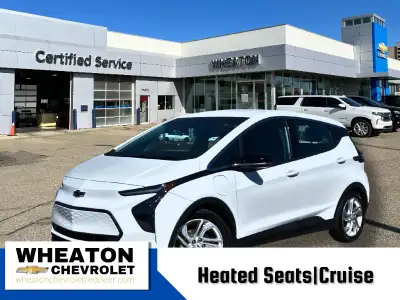 Experience the 2023 Chevrolet Bolt EV 1LT in Summit White – a smart, eco-friendly electric vehicle d...