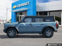 Explore the rugged charm of this 2022 Ford Bronco Big Bend, boasting a sleek Area 51 exterior and on... (image 2)