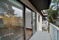 A quiet family-oriented apartment building surrounded by trees and the Gardens, they are spacious, w... (image 8)