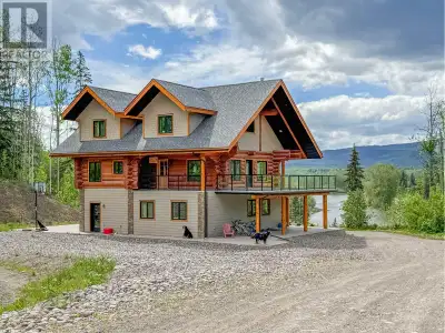 * PREC - Personal Real Estate Corporation. Custom log house located on 33+ acres of Bulkley River fr...