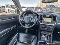 This Chrysler 300 has a trusty Regular Unleaded V-6 3.6 L/220 engine powering this Automatic transmi... (image 9)