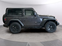 Get ready to command attention with the 2026 Jeep Wrangler Sport, a true symbol of adventure and rug... (image 5)