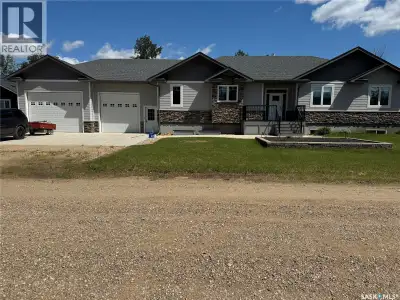 Welcome to 214 Hillside Drive at beautiful Tobin Lake, where luxury meets the outdoor lifestyle. Bui...