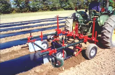 The Model 90 Mulch Layer is fully adjustable and free floating. A leveling blade up front level the...