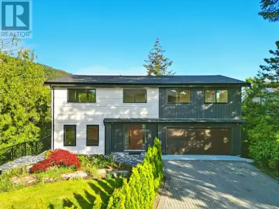 Perched on a gorgeous,sunny,16,553 sq/ft view lot rests this substantially renovated 4,100 sq/ft hou...