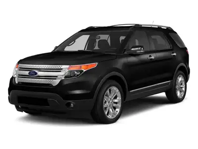 Experience the commanding presence and versatility of the 2015 Ford Explorer XLT in sleek black, equ...