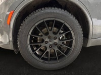 Experience the ultimate fusion of muscle-car attitude and three-row utility in this aggressive SUV,... (image 8)