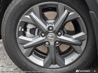Experience the all-new 2027 Honda HR-V LX AWD, a stunning black SUV designed to handle both city str... (image 7)