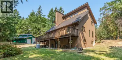 Nestled in the highly sought-after Woodley Ridge area, this immaculate West Coast-style home sits on...