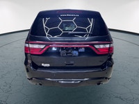 Step into the sophisticated allure of the 2024 Dodge Durango R/T Plus AWD, a striking SUV clad in a... (image 4)