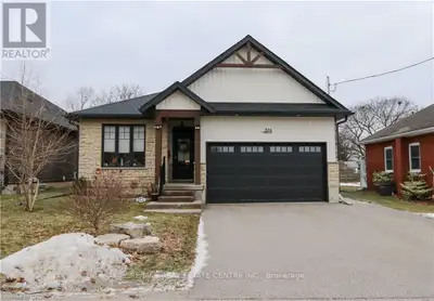 This beautiful bright bungalow was built with custom designer features and is located in the coveted...