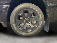 The 2026 Ram 1500 Big Horn 4x4 Crew Cab 57 Box comes in a striking Diamond Black Crystal Pearl finis... (image 8)