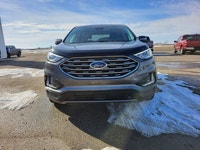 // EXCELLENT CONDITION! // This 2021 Ford Edge Titanium in Grey with a Black interior delivers upsca... (image 1)
