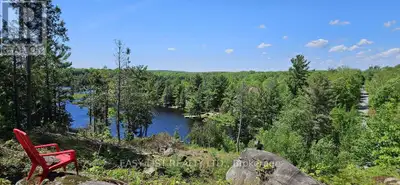 *** Visit the REALTOR website for further information about this Listing *** Unique waterfront build...