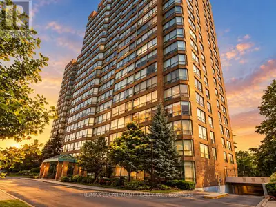 Discover refined condominium living at The Grande Regency, ideally situated in the heart of Burlingt...