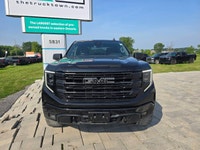 2022 GMC Sierra 1500 Elevation Crew Cab 4x4 with the 2.7L Turbo engine and a bold aftermarket upgrad... (image 1)