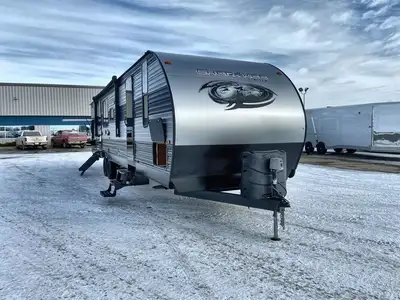 Explore the 2022 Forest River Cherokee 294KM travel trailer featuring a rear bunkroom, exterior kitc...