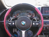 Experience the thrill of open-air driving in this stunning 2018 BMW 6 Series 650i xDrive Convertible... (image 9)