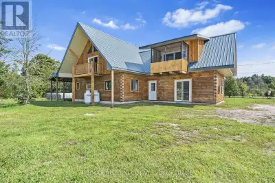 A Rare Find. Look no further! This 3000 +/- Handcrafted log and timber-frame home is situated on 5+/...