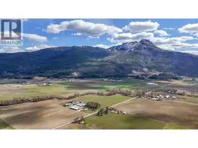 This 10 acre treed and vacant property has an amazing panoramic view of City, lake and mountains and...