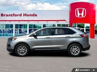 Command the road and embrace adventure in this sophisticated 2023 Ford Edge SEL, striking in Silver.... (image 1)