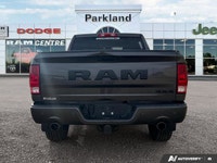 Feel the surge of a legendary *5.7L Hemi V8 engine* under your command with this striking *2023 Ram... (image 4)
