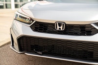 Passenger Illuminated Visor Mirror,Traction Control,Heated Mirrors,Pass-Through Rear Seat,Power Stee... (image 2)