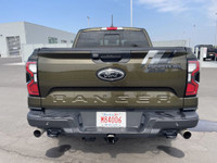 The 2024 Ford Ranger Raptor, finished in Shelter Green with refined Ebony leather-trimmed seats, is... (image 7)