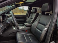 Introducing the stunning 2019 Jeep Grand Cherokee Limited 4x4, a vibrant orange SUV that promises an... (image 8)