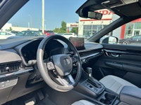 Experience the refined luxury and efficiency of this 2025 Honda CR-V Hybrid Touring, boasting a slee... (image 9)