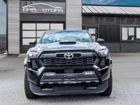 WAS: $51999 NOW: $49999 plus taxes and licensing fees2024 Toyota Tacoma 4x4 Double Cab with manual t... (image 1)