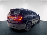 The 2025 Dodge Durango GT Plus AWD in sleek black from Canada Auto Remarketing Superstore is the per... (image 5)