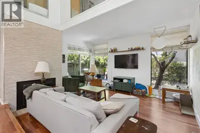 Nestled in the sought-after Arbutus West complex, this partially renovated townhome blends classic W...