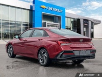 Luxury IVT ... Engine: Regular Unleaded I-4 2.0 L/122 Other Equipment ULTIMATE RED,BLACK LEATHERETTE... (image 2)
