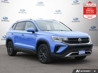 New Price! Odometer is 10494 kilometers below market average! Blue 2024 Volkswagen Taos Comfortline... (image 1)