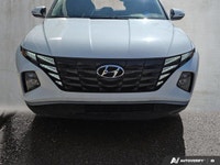 This Tucson comes with; Rear Defrost, Front Wheel Drive, Power Door Locks, Brake Assist, Power Steer... (image 8)