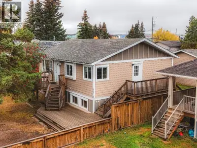 This well-maintained family home with a large detached garage is move-in ready and available for qui...