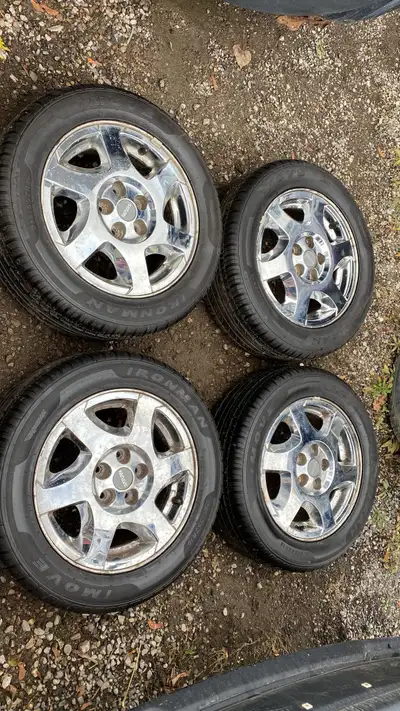 RIMS 16" CHROME RIMS Off of a 2005 Saturn L200 5x110 TIRES 215 55 16 Ironman Imove All Season Tread...