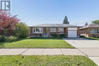 Welcome to 61 Fairlawn Rd, a brick bungalow with a covered front porch, an attached garage and much...