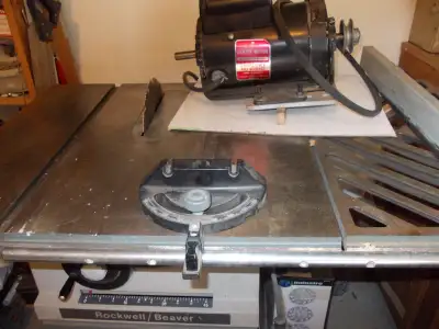 1-Rockwell Beaver 9" Table Saw ,comes with a 1-HP electric motor, ripping fence, and mitre bar. This...