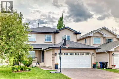 Welcome to this exceptional walkout home nestled on a quiet street in the highly sought-after commun...