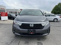 Engineered for memorable family journeys, this 2024 Honda Odyssey Touring in sophisticated Modern St... (image 1)